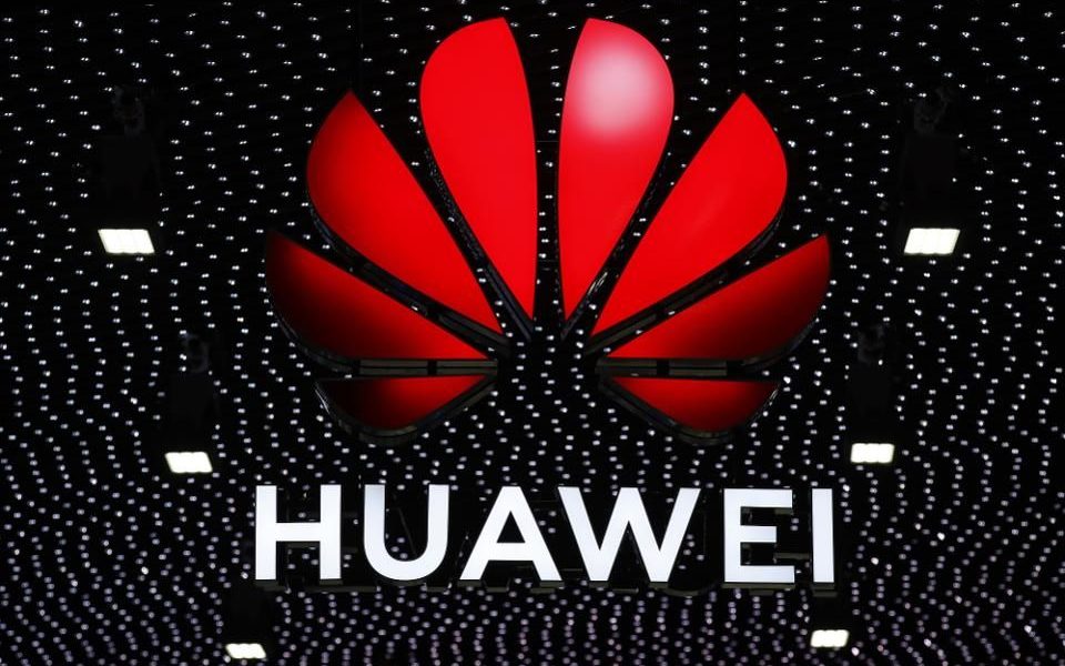 Huawei logo stands